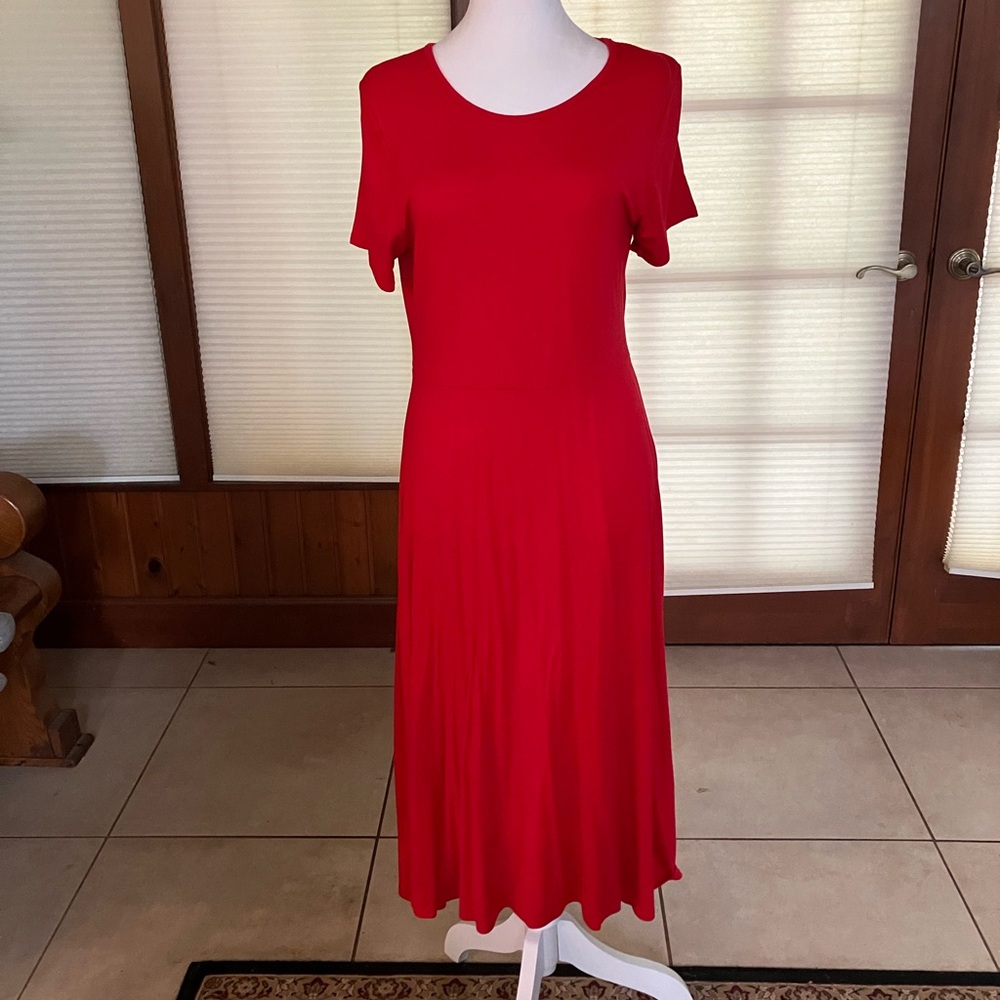 Red dress. Easy wear and care.  Never worn NWT